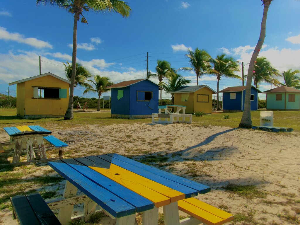 KODAK Digital Still Camera Bahama beach scene with picnic tables and beach cabanas
