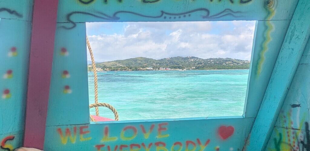 view through a boat window on the Caribbean ocean in Tobago