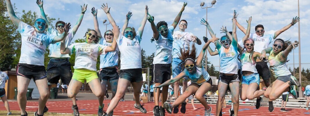 students-jumping-for-joy-during-the-annual-lutefit-color-run-1068x400