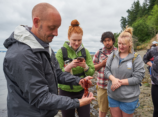 Field trip for the PLU summer student-faculty researchers with the biology faculty to Owen Beach during a -3 low tide to see the life that is exposed, Tuesday, July 2, 2019. (Photo/John Froschauer) with Michael Behrens