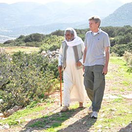 Chris Stevens walking with another person