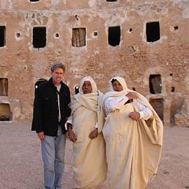 Chris Stevens posing with two others