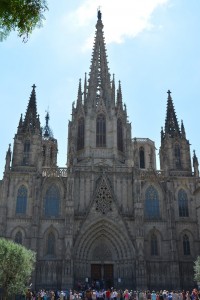 2017 Spain and Portugal University Wind Ensemble Trip - A group of people standing in front of Barcelona Cathedral.