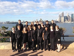 2013 Australia University Wind Ensemble Trip - People in front of the Sydney opera house during the day.