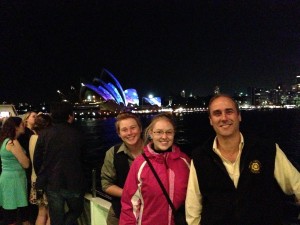 2013 Australia University Wind Ensemble Trip - People in front of the Sydney opera house at night.
