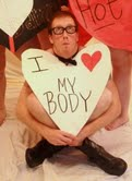 Jeremy Wilks holding I love my body sign