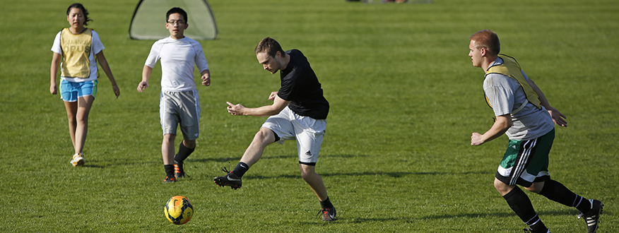 students playing soccer